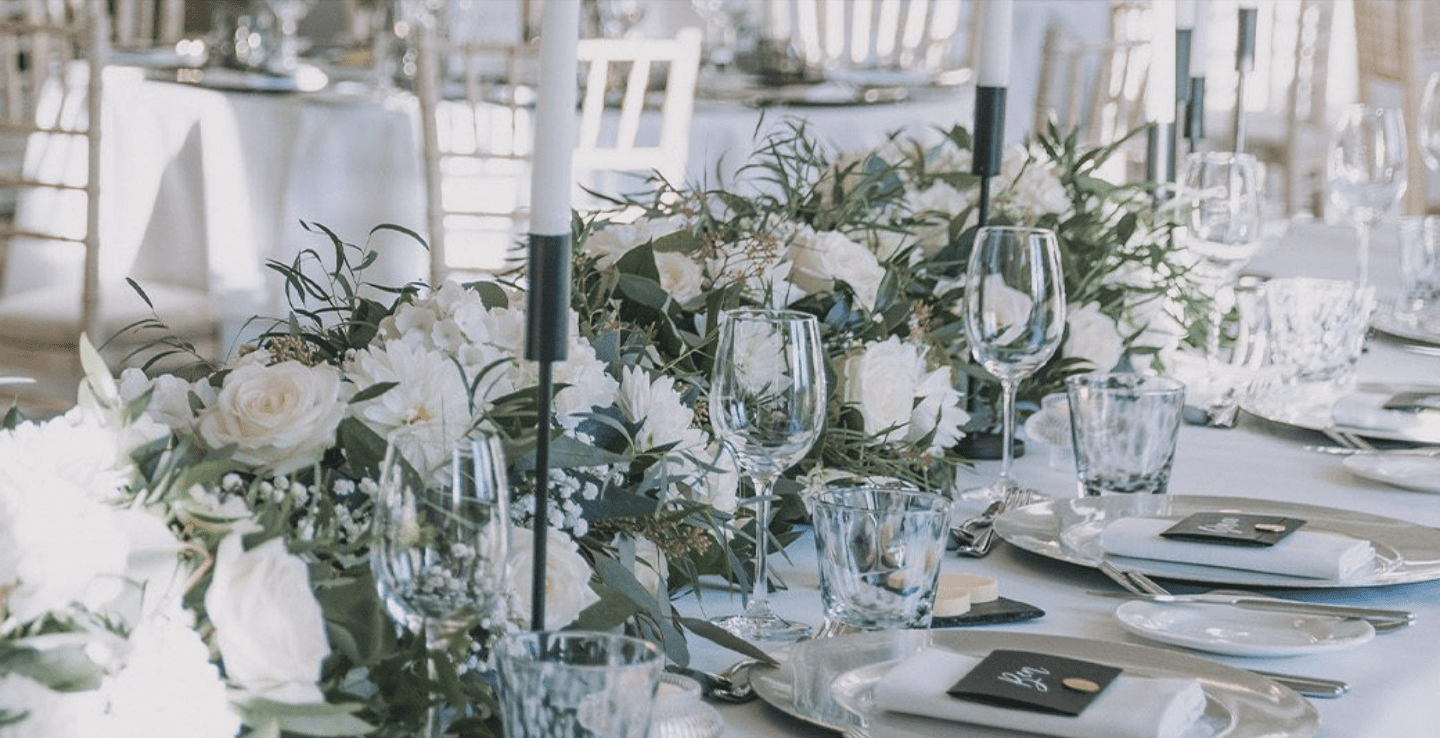 Wedding venues Worcestershire, Brockencote Hall table setting with pristine glasses and table flowers